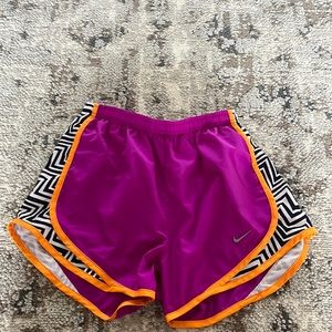 Nike shorts. Size xsmall. Magenta with orange outline and print on mesh